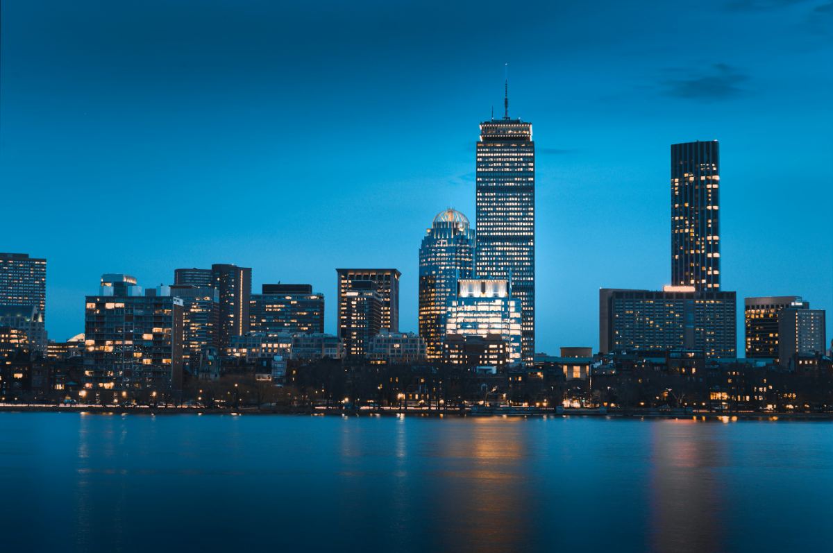 Boston skyline at dusk seen from across the Charles River